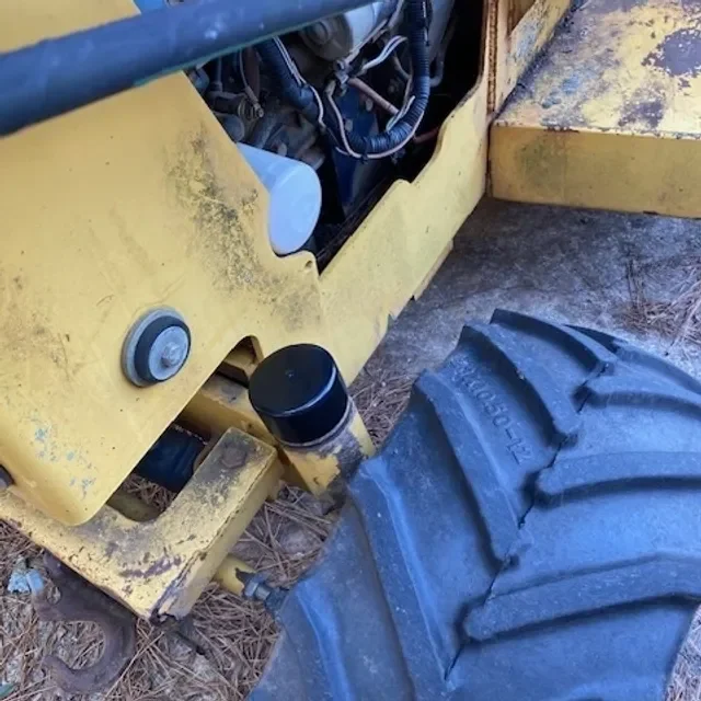 Yellow construction vehicle tire and hydraulic component